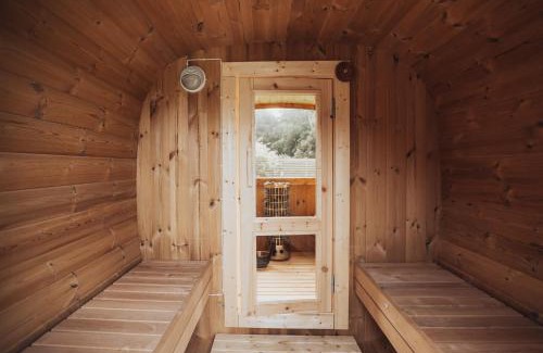 Dalby Huse House | Fjordhygge: Cozy Log Cabin by the Water and Forest