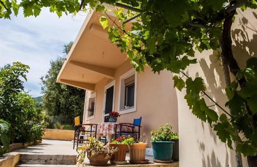 Poulata Apartment | Pet-Friendly Retreat: Flamiatos Garden Cottages, 4-Star Stay