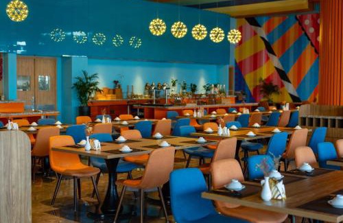 Hoang Hoa Hotel | Elegant Flamingo Ibiza Hải Tiến Resort with Oceanfront Views
