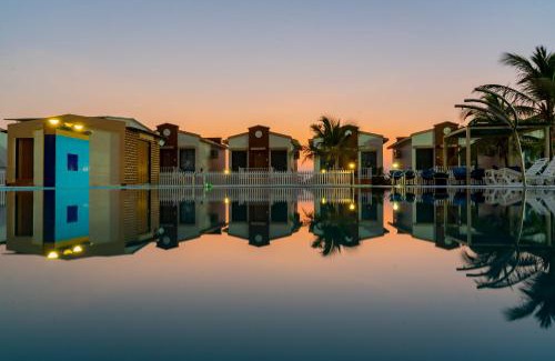 Una Hotel | Explore Flamingo Club and Resort Near Diu with Pool Access