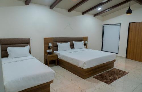 Una Hotel | Explore Flamingo Club and Resort Near Diu with Pool Access