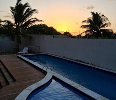 Praia do Meio Apartment | Cozy Casa Coliseu: Oceanfront Stay with Private Beach Access