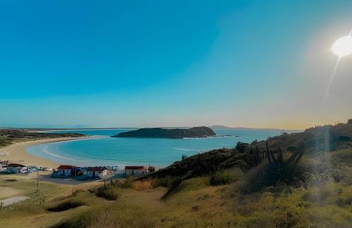 Cabo Frio Apartment | Stunning Oceanfront Flat with Pool & Wi-Fi, Rated 9.3/10