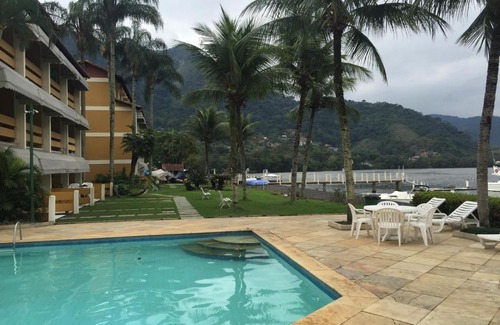 Caieira Apartment | Discover Flat Angra Paradise: Ocean View and Pool Access