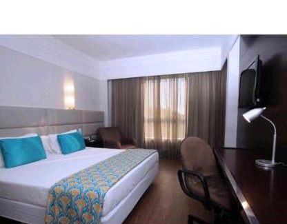 Serra Hotel | Discover Hotel BH Savassi: Poolside Relaxation Awaits