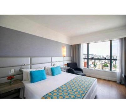 Serra Hotel | Discover Hotel BH Savassi: Poolside Relaxation Awaits