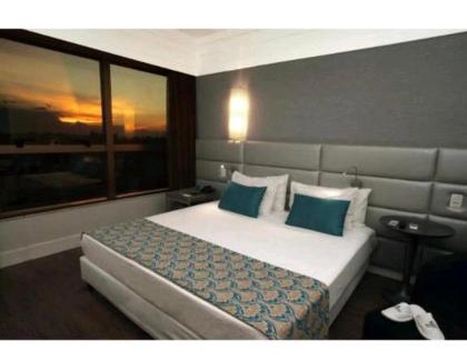 Serra Hotel | Discover Hotel BH Savassi: Poolside Relaxation Awaits