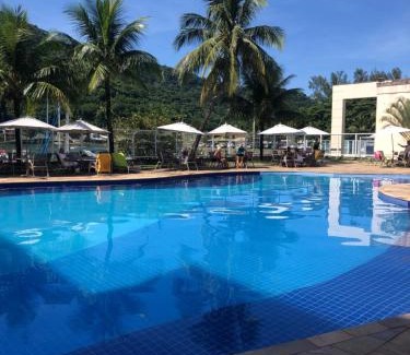Itacuruca Apartment | Stylish Flat Clarissinha with Ocean View & Spa Retreat