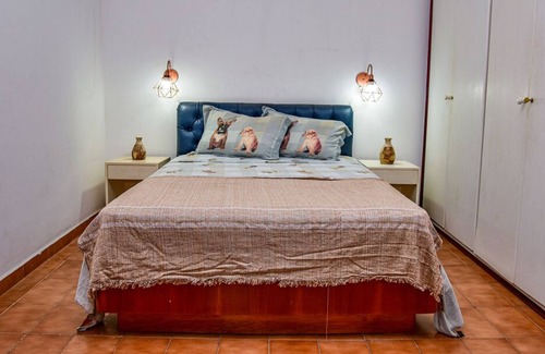 Morro do Maluf Apartment | Cozy Flat with Balcony near Pitangueiras Beach, Guarujá