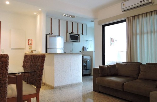 Pitangueiras Apartment | Beautiful Flat in Guarujá Steps from the Beach with Pool