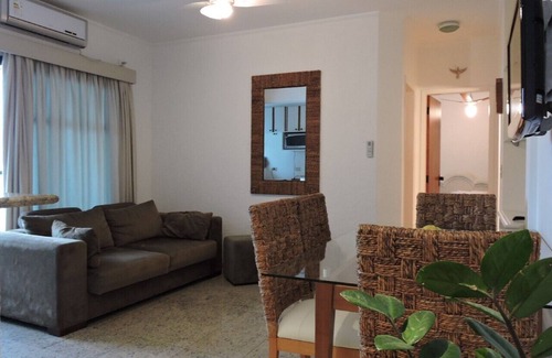 Pitangueiras Apartment | Beautiful Flat in Guarujá Steps from the Beach with Pool