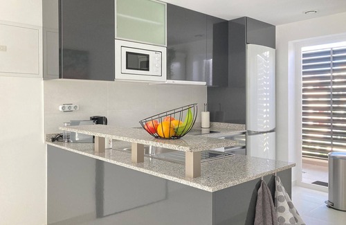 Els Arenals del Sol Apartment | Enjoy a Relaxing Getaway in an Inviting Oceanfront Apartment