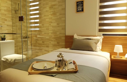 Kemang Hotel | Discover Flat06 Tendean: Family-Friendly Stay with Breakfast