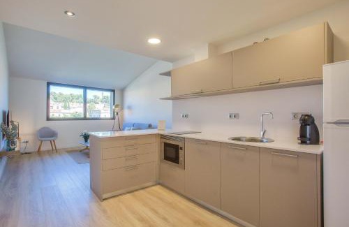 el Mercadal Apartment | Exclusive Stay at Flateli - Plaça Catalunya with Family Amenities