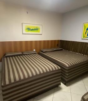 Do Turista Apartment | Experience Apt 711: Poolside Relaxation with Ocean Views