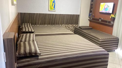 Do Turista Apartment | Experience Apt 711: Poolside Relaxation with Ocean Views