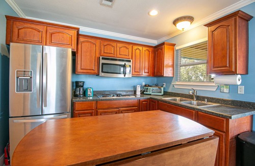 Gulfport Apartment | Flirty Flamingo Retreat: Oceanfront Escape with Pool