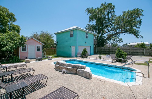 Gulfport Apartment | Flirty Flamingo Retreat: Oceanfront Escape with Pool