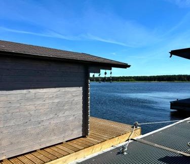 Plavniekkalns House | Unforgettable Floating Camp House with Private Beach Access