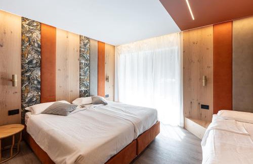 Moena Hotel | Pet-Friendly Flos Hotel: Oceanfront Bliss & Spa Retreat