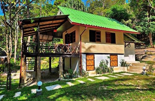Ranong Resort | Relax at Flower Power Farm Village: Pool & Oceanfront Bliss