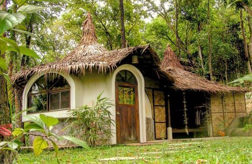 Ranong Resort | Relax at Flower Power Farm Village: Pool & Oceanfront Bliss