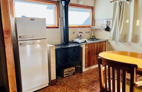 Junin de los Andes Cabin | Cozy Fly Fishing Cabin with Lake View and Spa Amenities