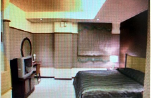 Baihe Hotel | Relaxing Fontaineblean Hot Spring with Inviting Hot Tub