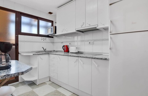 Carihuela Apartment | Fontana: Beachside Retreat with Pool and Sea Views