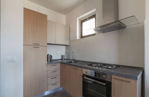 Centro Giano Apartment | Discover the Fonte Laurentina GREEN Apartment Experience