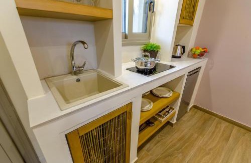 Koukounaries Apartment | Inviting Forest Resort Suites: Family-Friendly Getaway