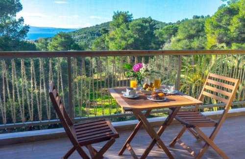 Koukounaries Apartment | Inviting Forest Resort Suites: Family-Friendly Getaway