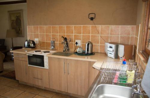 Knysna Resort | Scenic Forest Valley Cottages with Ocean View & Hot Tub