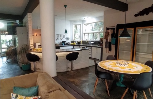 Florianopolis Bed & Breakfast | Foresthouse Hostel and Events: Relax by the Oceanfront Pool