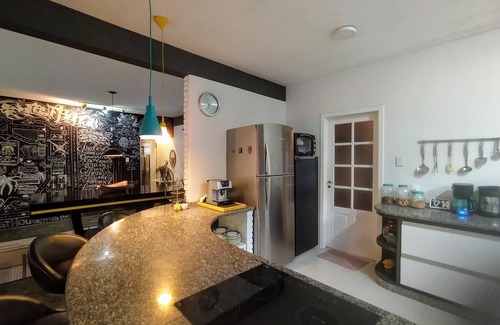 Florianopolis Bed & Breakfast | Foresthouse Hostel and Events: Relax by the Oceanfront Pool