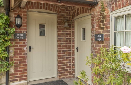 West Lulworth Cottage | Pet-Friendly Forge Cottage with Garden in West Lulworth