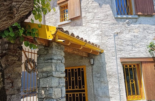 Ramponio Verna House | Picturesque Barn Retreat with Lake Views and Garden Access