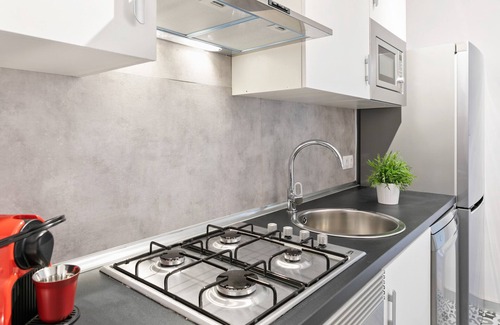 Sant Marti Apartment | Comfortable Forum 4 Apartment with Spa and Family Amenities