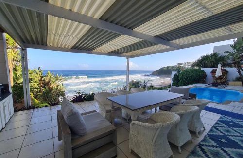 Shaka's Rock House | Beachfront Retreat: 4-Bedroom Main & Cozy Cottage