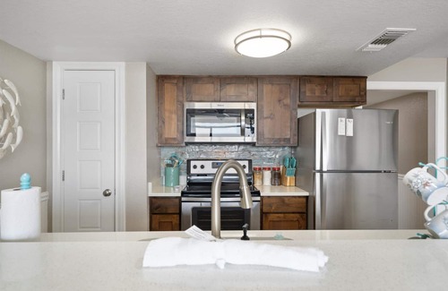 Rockport Condo | Pet Friendly Four Point Lighthouse with Lagoon Views & Spa