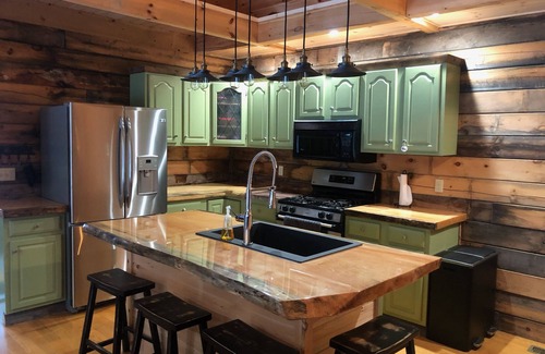 Jackman House | Inviting Four Season Log Cabin on Moose River with Pool