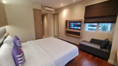 Tanjung Duren Utara Hotel | Comfortable FOX Lite Grogol Jakarta with Family-Friendly Amenities