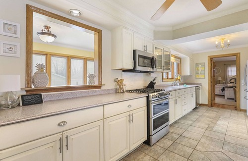 McHenry House | Perfect Fox River Waterfront Home with Hot Tub & Views