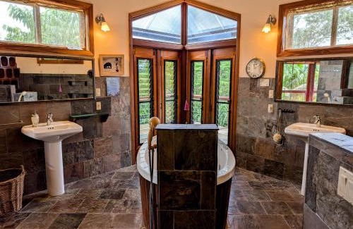 San Ignacio Villa | Framadani estate - Villa with a pool and Or thatch roof Cabin