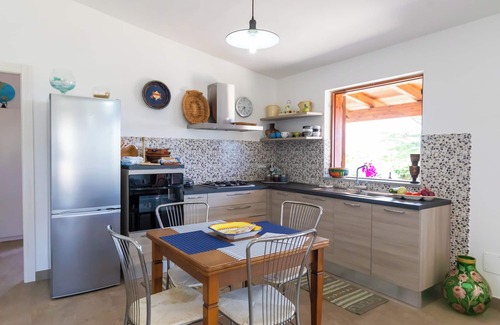 Ricadi House | Experience Francesco and Michaela Villas with Unique Amenities