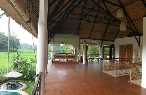 Mambal Villa | Discover Frangipani Villas: Oceanfront Oasis with Spa & Pools