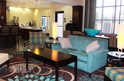 Spring Branch West Condo | Enjoy Free Breakfast and Relax by the Pool at Our Hotel