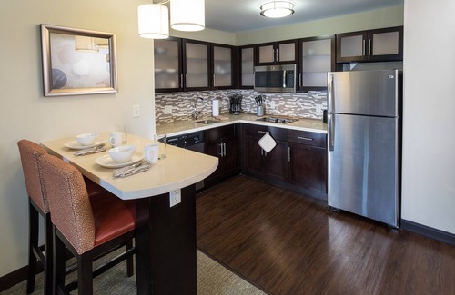 West Omaha Condo | Indulge in Free Breakfast & Relaxing Pool Near Nebraska Medical Center