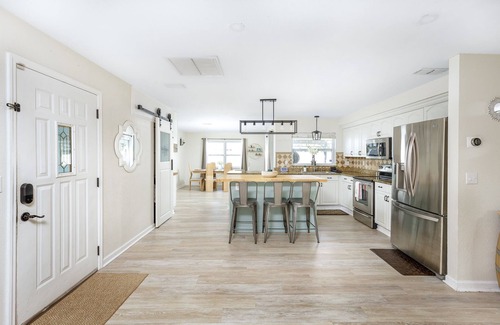 Pinellas Park House | Idyllic Heated Pool Retreat Steps from the Beach with Water Slide