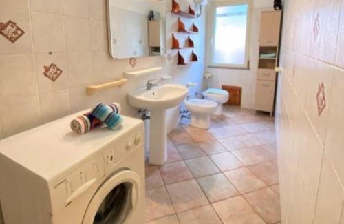 Badualga Apartment | Ideal Family Retreat: Free Parking & BBQ Just Minutes from the Sea